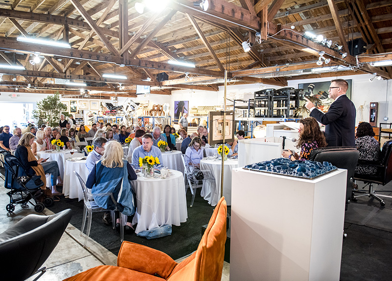 A photograph of an auction event at Palm Beach Modern Auctions